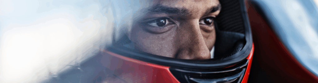 Header image IT Karting - man sitting in kart with helmet on